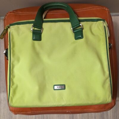 Tumi 13″ lime green laptop bag