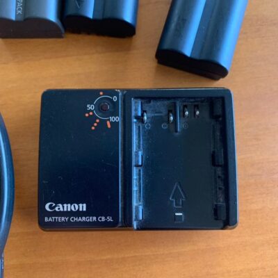 Canon CB-5L battery charger with 3 used batteries