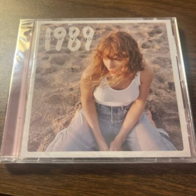 1989 CD with Polaroids