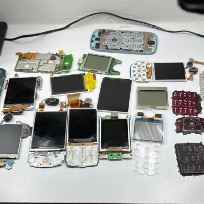 Assorted working cellphone components screens, keypads for repair techs